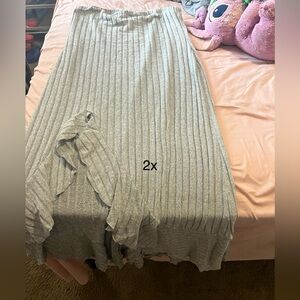 Strapless dress with slit and ruffles